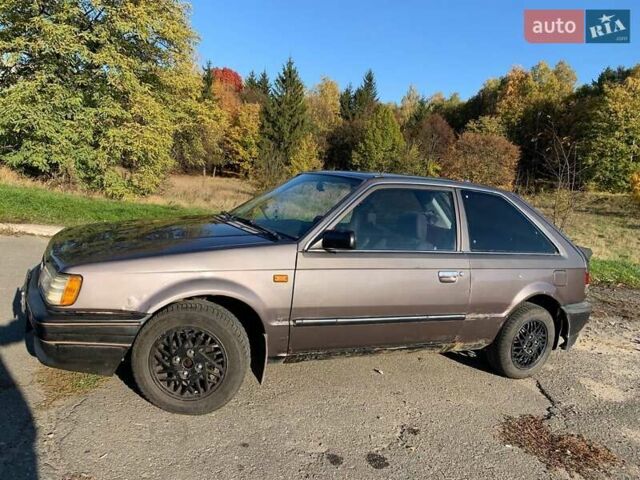 Коричневый Мазда 323, объемом двигателя 1.3 л и пробегом 475 тыс. км за 1300 $, фото 11 на Automoto.ua