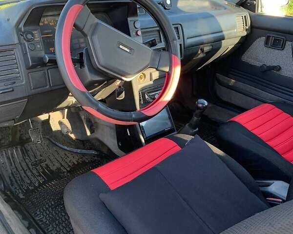 Коричневый Мазда 323, объемом двигателя 1.3 л и пробегом 475 тыс. км за 1300 $, фото 1 на Automoto.ua