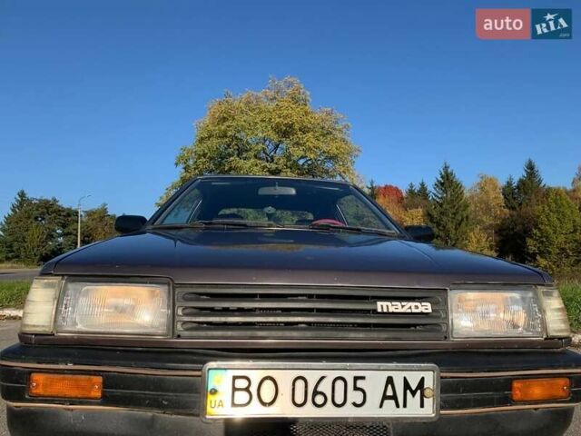 Коричневый Мазда 323, объемом двигателя 1.3 л и пробегом 475 тыс. км за 1300 $, фото 16 на Automoto.ua