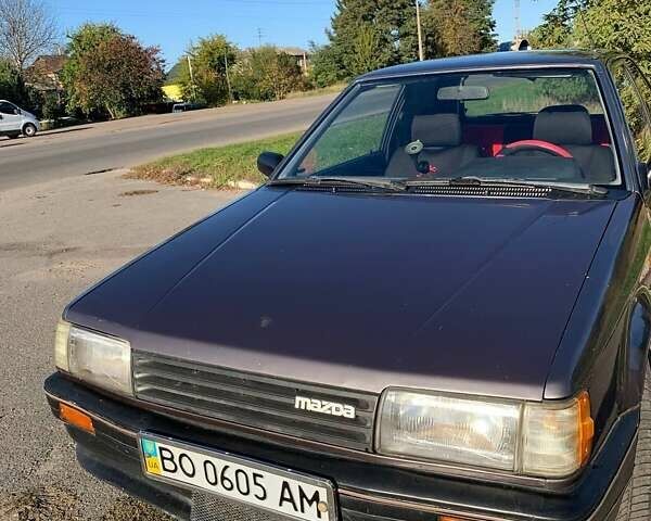 Коричневый Мазда 323, объемом двигателя 1.3 л и пробегом 475 тыс. км за 1300 $, фото 18 на Automoto.ua