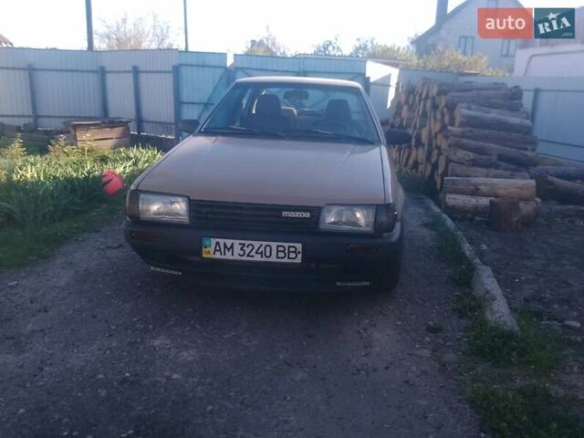 Коричневый Мазда 323, объемом двигателя 0 л и пробегом 230 тыс. км за 1300 $, фото 1 на Automoto.ua