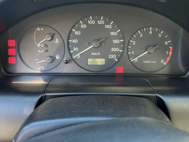 Коричневый Мазда 323, объемом двигателя 1.6 л и пробегом 199 тыс. км за 2400 $, фото 4 на Automoto.ua