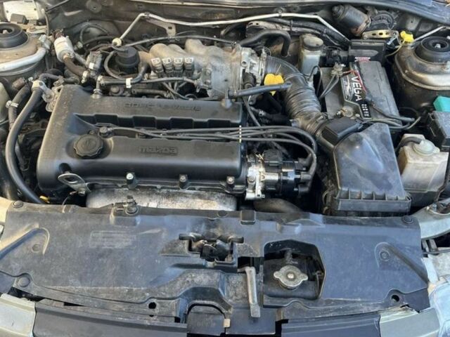 Коричневый Мазда 323, объемом двигателя 1.6 л и пробегом 199 тыс. км за 2400 $, фото 7 на Automoto.ua