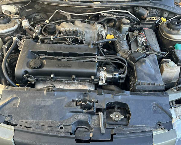 Коричневый Мазда 323, объемом двигателя 1.6 л и пробегом 199 тыс. км за 2600 $, фото 5 на Automoto.ua