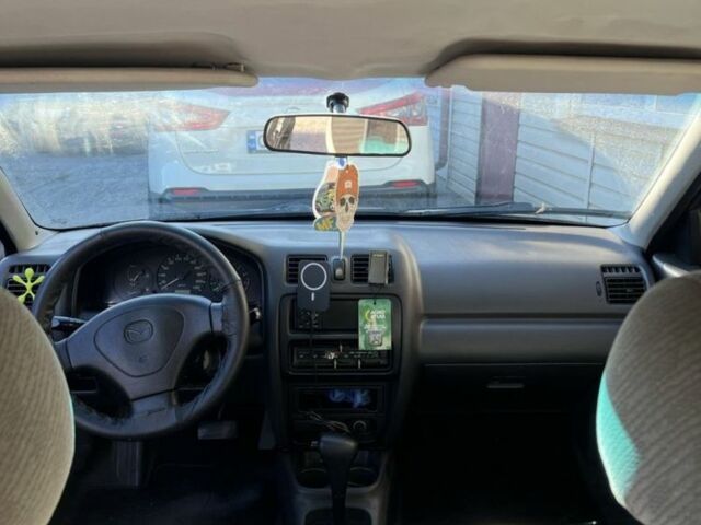 Коричневый Мазда 323, объемом двигателя 1.6 л и пробегом 199 тыс. км за 2400 $, фото 8 на Automoto.ua