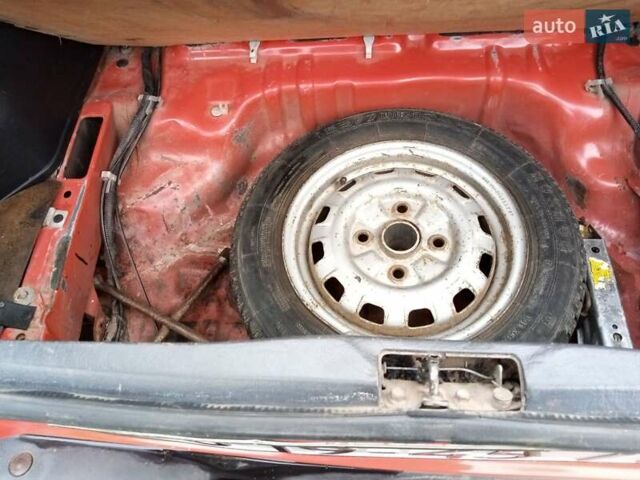 Червоний Мазда 323, об'ємом двигуна 1.3 л та пробігом 250 тис. км за 950 $, фото 18 на Automoto.ua