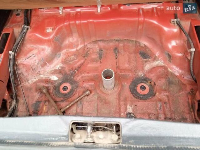 Червоний Мазда 323, об'ємом двигуна 1.3 л та пробігом 250 тис. км за 950 $, фото 17 на Automoto.ua