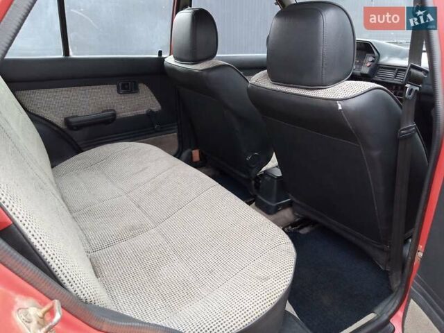 Червоний Мазда 323, об'ємом двигуна 1.3 л та пробігом 250 тис. км за 950 $, фото 11 на Automoto.ua