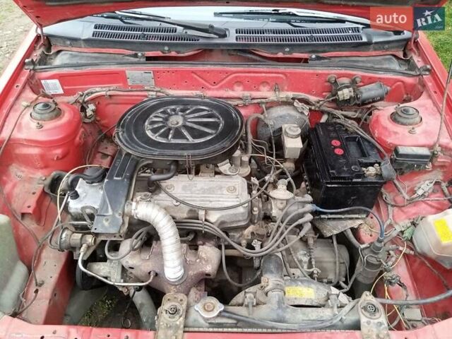 Червоний Мазда 323, об'ємом двигуна 1.3 л та пробігом 250 тис. км за 950 $, фото 14 на Automoto.ua
