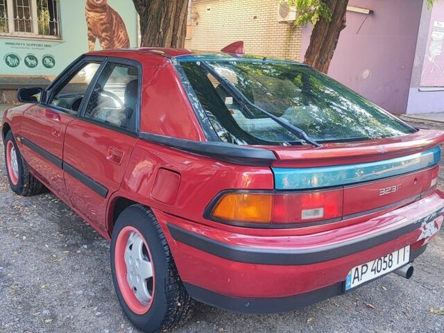 Красный Мазда 323, объемом двигателя 1.8 л и пробегом 444 тыс. км за 1200 $, фото 5 на Automoto.ua