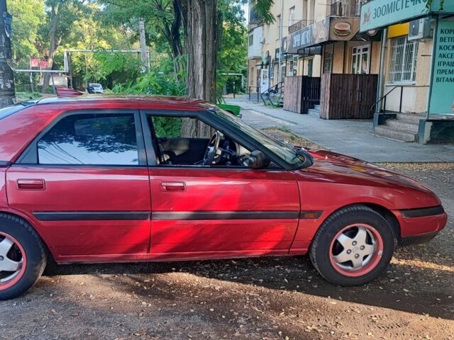 Красный Мазда 323, объемом двигателя 1.8 л и пробегом 444 тыс. км за 1200 $, фото 3 на Automoto.ua