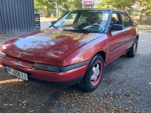 Красный Мазда 323, объемом двигателя 1.8 л и пробегом 444 тыс. км за 1200 $, фото 7 на Automoto.ua