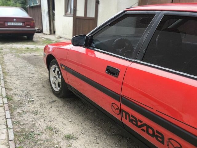 Красный Мазда 323, объемом двигателя 1 л и пробегом 317 тыс. км за 1100 $, фото 4 на Automoto.ua