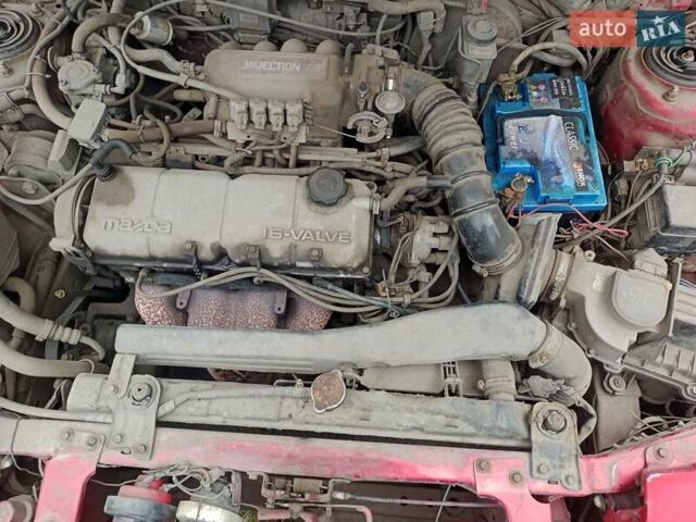 Красный Мазда 323, объемом двигателя 1.8 л и пробегом 359 тыс. км за 1800 $, фото 11 на Automoto.ua