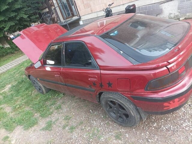 Красный Мазда 323, объемом двигателя 2 л и пробегом 400 тыс. км за 1500 $, фото 2 на Automoto.ua