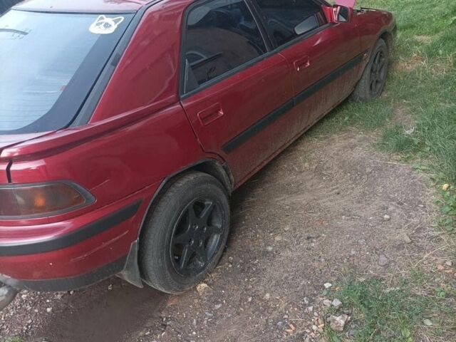 Красный Мазда 323, объемом двигателя 2 л и пробегом 400 тыс. км за 1500 $, фото 4 на Automoto.ua