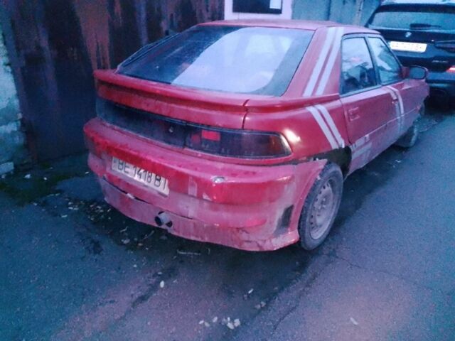 Красный Мазда 323, объемом двигателя 1.6 л и пробегом 999 тыс. км за 500 $, фото 4 на Automoto.ua