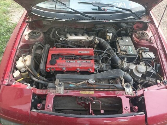 Красный Мазда 323, объемом двигателя 2 л и пробегом 400 тыс. км за 1500 $, фото 1 на Automoto.ua