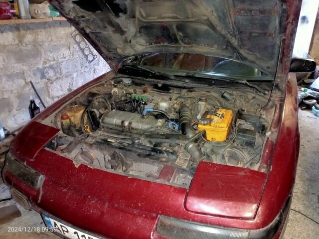 Красный Мазда 323, объемом двигателя 1.6 л и пробегом 400 тыс. км за 1500 $, фото 1 на Automoto.ua