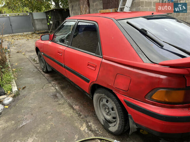Красный Мазда 323, объемом двигателя 1.6 л и пробегом 400 тыс. км за 1297 $, фото 2 на Automoto.ua