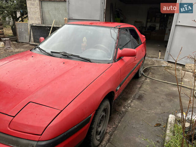 Красный Мазда 323, объемом двигателя 1.6 л и пробегом 400 тыс. км за 1297 $, фото 1 на Automoto.ua