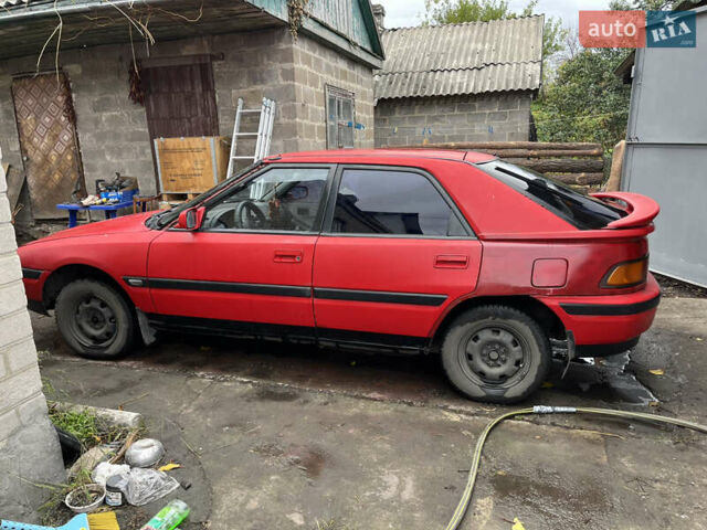 Красный Мазда 323, объемом двигателя 1.6 л и пробегом 400 тыс. км за 1297 $, фото 3 на Automoto.ua