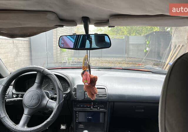 Красный Мазда 323, объемом двигателя 1.6 л и пробегом 400 тыс. км за 1297 $, фото 7 на Automoto.ua