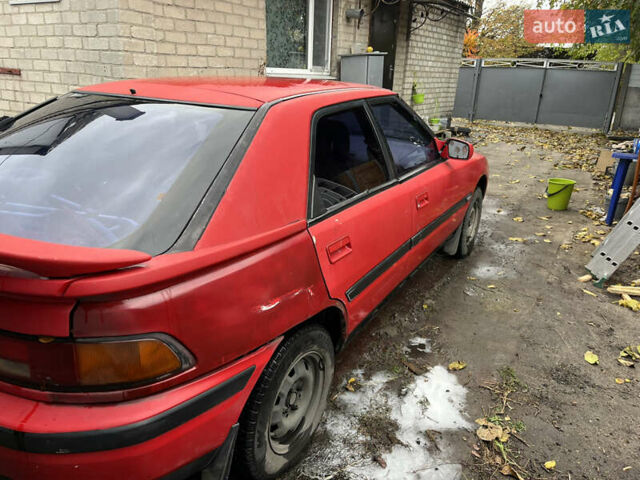 Красный Мазда 323, объемом двигателя 1.6 л и пробегом 400 тыс. км за 1297 $, фото 5 на Automoto.ua