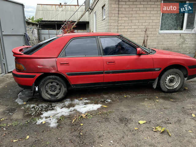 Красный Мазда 323, объемом двигателя 1.6 л и пробегом 400 тыс. км за 1297 $, фото 6 на Automoto.ua