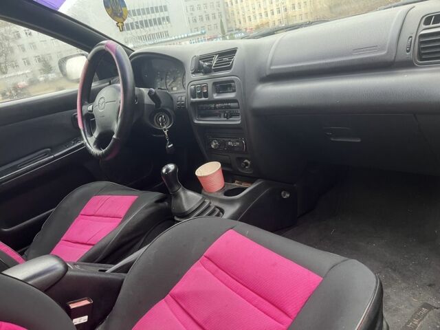 Красный Мазда 323, объемом двигателя 1.5 л и пробегом 323 тыс. км за 1100 $, фото 11 на Automoto.ua