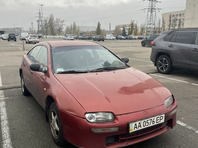 Красный Мазда 323, объемом двигателя 1.5 л и пробегом 323 тыс. км за 1100 $, фото 15 на Automoto.ua