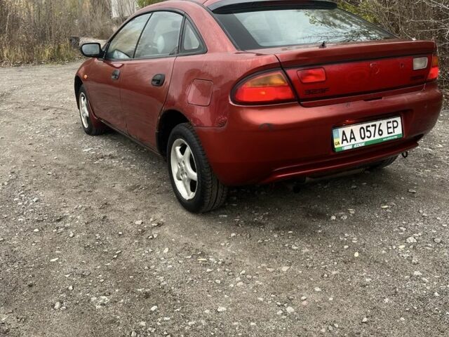 Красный Мазда 323, объемом двигателя 1.5 л и пробегом 323 тыс. км за 1100 $, фото 7 на Automoto.ua