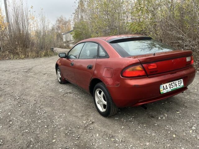 Красный Мазда 323, объемом двигателя 1.5 л и пробегом 323 тыс. км за 1100 $, фото 1 на Automoto.ua