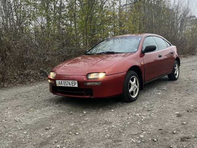 Красный Мазда 323, объемом двигателя 1.5 л и пробегом 323 тыс. км за 1100 $, фото 6 на Automoto.ua