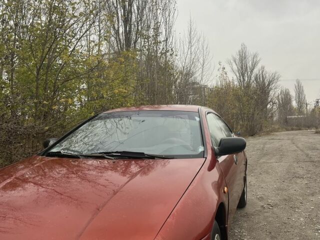 Красный Мазда 323, объемом двигателя 1.5 л и пробегом 323 тыс. км за 1100 $, фото 2 на Automoto.ua