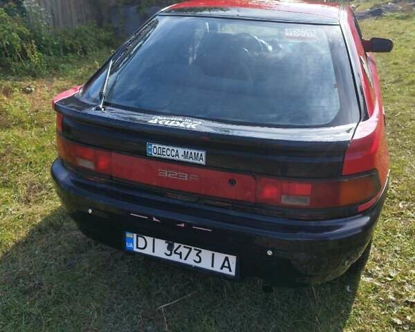Красный Мазда 323, объемом двигателя 1.6 л и пробегом 328 тыс. км за 2000 $, фото 6 на Automoto.ua