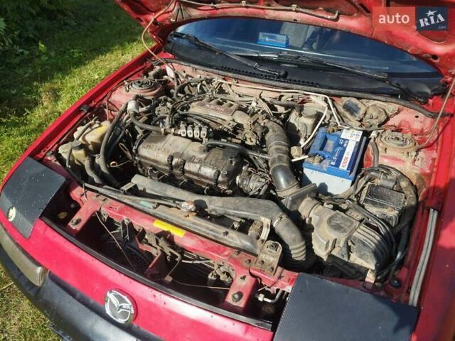 Красный Мазда 323, объемом двигателя 1.6 л и пробегом 328 тыс. км за 2000 $, фото 14 на Automoto.ua