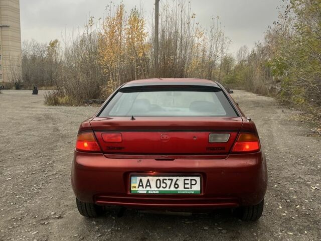 Красный Мазда 323, объемом двигателя 1.5 л и пробегом 323 тыс. км за 1100 $, фото 3 на Automoto.ua