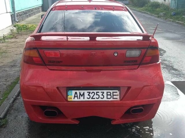 Красный Мазда 323, объемом двигателя 2 л и пробегом 300 тыс. км за 800 $, фото 2 на Automoto.ua