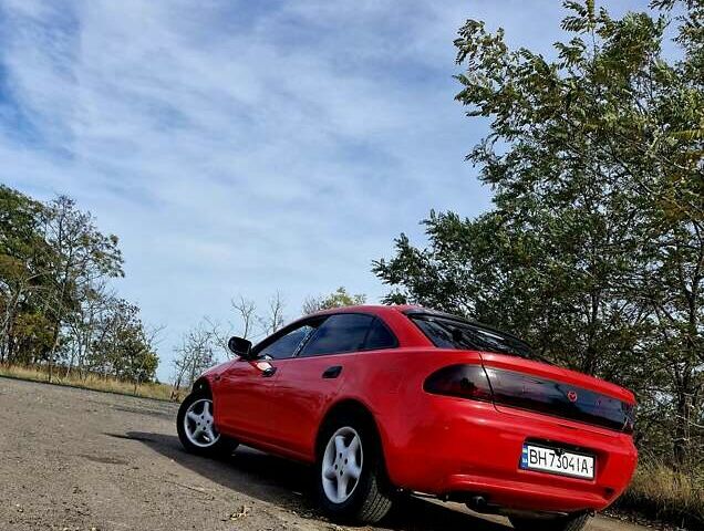 Красный Мазда 323, объемом двигателя 1.84 л и пробегом 303 тыс. км за 2650 $, фото 2 на Automoto.ua