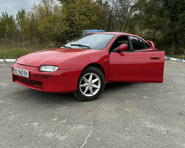 Красный Мазда 323, объемом двигателя 1.49 л и пробегом 450 тыс. км за 2000 $, фото 1 на Automoto.ua
