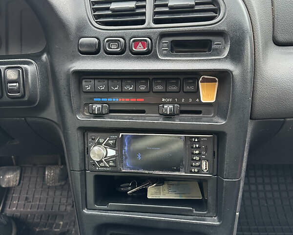 Красный Мазда 323, объемом двигателя 1.49 л и пробегом 450 тыс. км за 2000 $, фото 11 на Automoto.ua