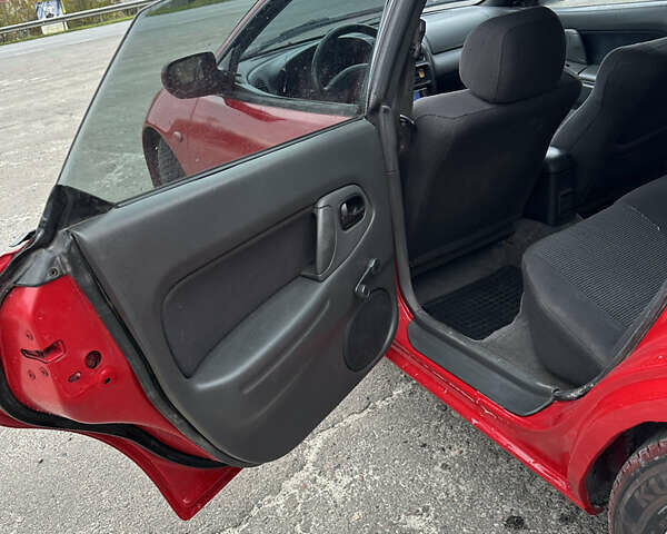 Красный Мазда 323, объемом двигателя 1.49 л и пробегом 450 тыс. км за 2000 $, фото 9 на Automoto.ua