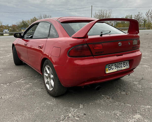 Красный Мазда 323, объемом двигателя 1.49 л и пробегом 450 тыс. км за 2000 $, фото 3 на Automoto.ua