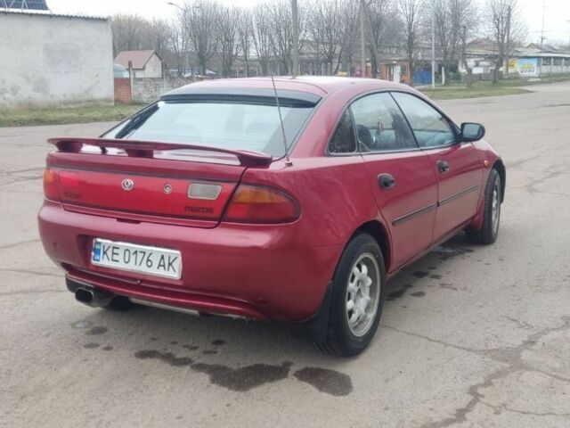 Красный Мазда 323, объемом двигателя 1.5 л и пробегом 367 тыс. км за 2400 $, фото 4 на Automoto.ua