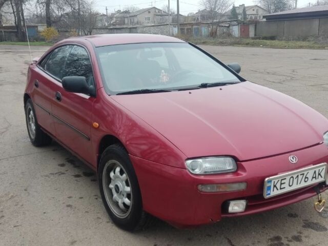 Красный Мазда 323, объемом двигателя 1.5 л и пробегом 367 тыс. км за 2400 $, фото 6 на Automoto.ua