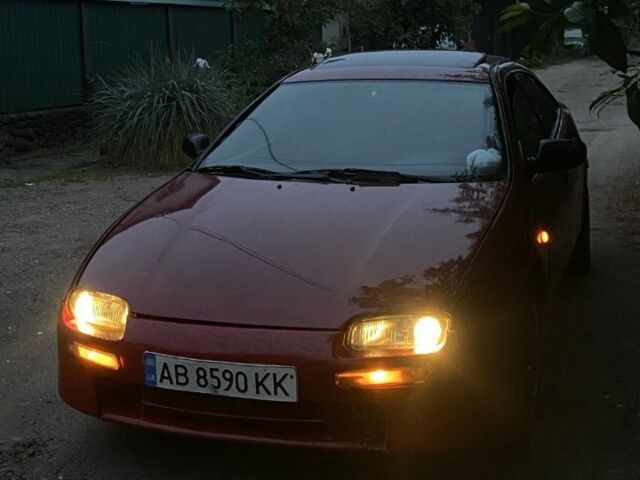 Красный Мазда 323, объемом двигателя 1.5 л и пробегом 639 тыс. км за 2100 $, фото 2 на Automoto.ua