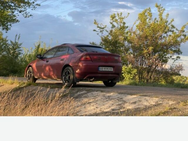 Красный Мазда 323, объемом двигателя 1.5 л и пробегом 639 тыс. км за 2100 $, фото 4 на Automoto.ua