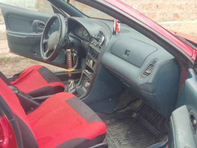 Красный Мазда 323, объемом двигателя 1.5 л и пробегом 367 тыс. км за 2400 $, фото 8 на Automoto.ua