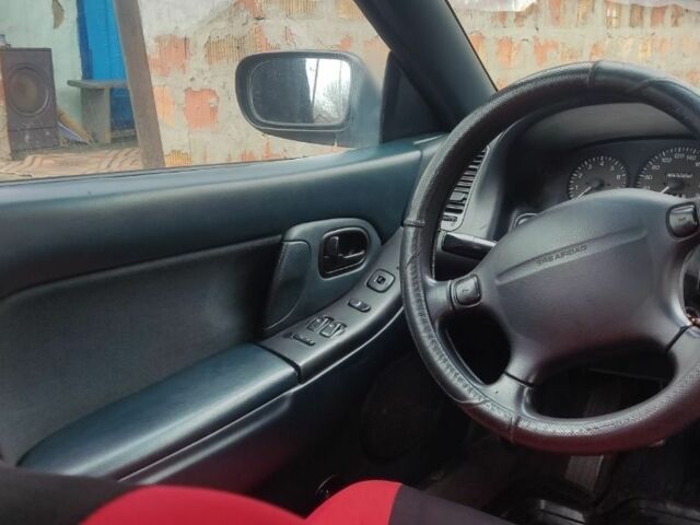 Красный Мазда 323, объемом двигателя 1.5 л и пробегом 367 тыс. км за 2400 $, фото 10 на Automoto.ua